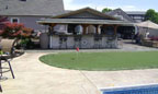 Backyard Bar, Putting Green, and Swimming Pool Deck