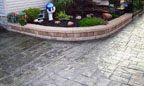 Stamped Concrete Patio and Masonry Retaining Wall